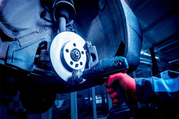 person doing a service of brakes